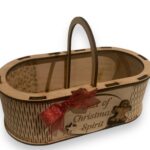 a wooden basket with a red bow, living hinge, laser cut and personalised